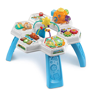 Speeltafeltje met wit en blauw met verschillende speelelementen Speeltafeltje met wit en blauw met verschillende speelelementen