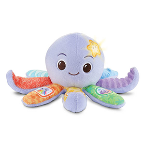 Een lila knuffel in de vorm van een octopus met verschillende kleuren tentakels